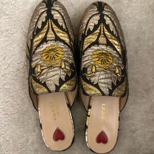 Gucci Women's Gold and Black Mules